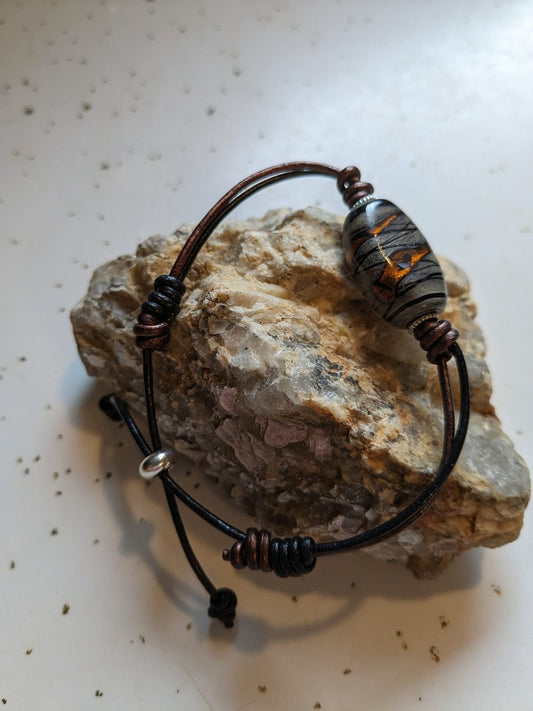 Black and Bronze Leather Bracelet with Handmade Ceramic Bead