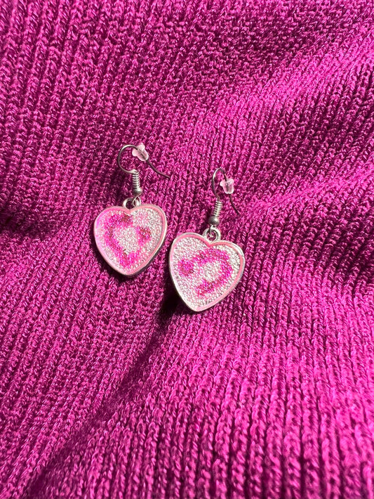 Silver Heart Earrings with Fuchsia Symbols on Pink