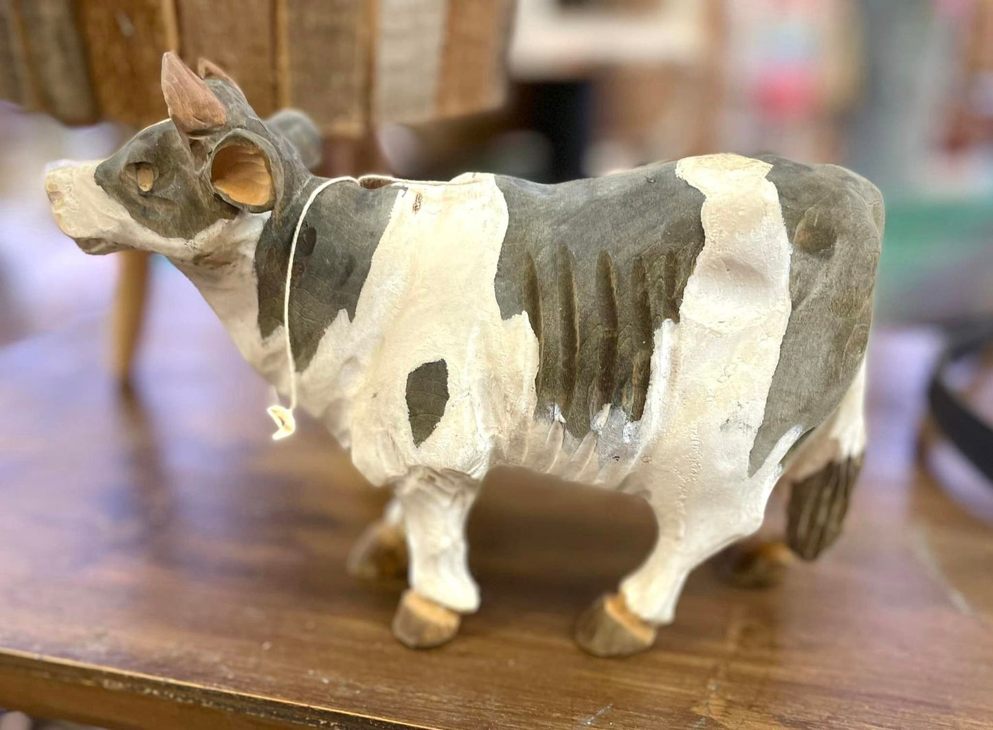 Hand carved wooden cow