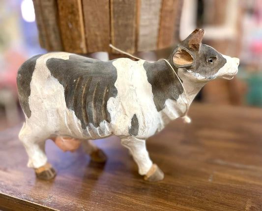 Hand carved wooden cow